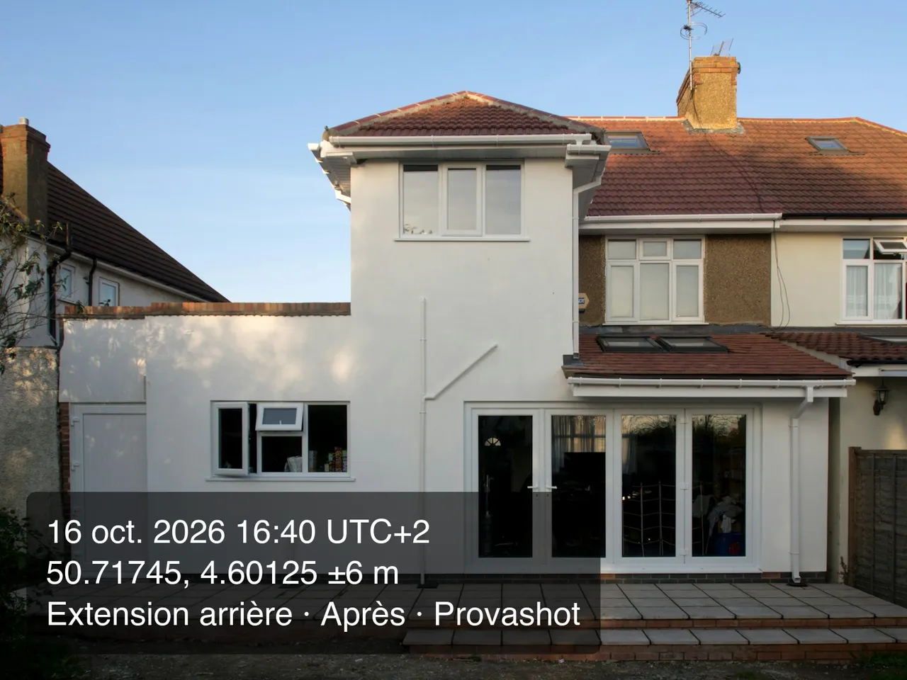 Finished house extension, with the Provashot stamp burned in at the bottom left: 16 October 2026 at 16:40 UTC+2, GPS position to ±6 m, the job name and the After phase